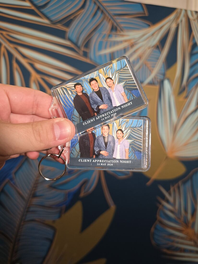 Branded photo keychains from a corporate client appreciation night in Singapore